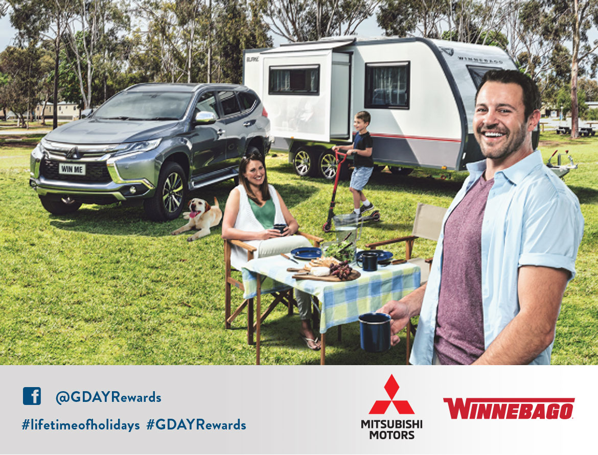 A family enjoying a camping holiday with their car, camper, and dog.